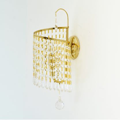 أبليك ذهبي من ماكينزي، بإضاءة واحدة، من إنتاج شركة قنديل المصرية.